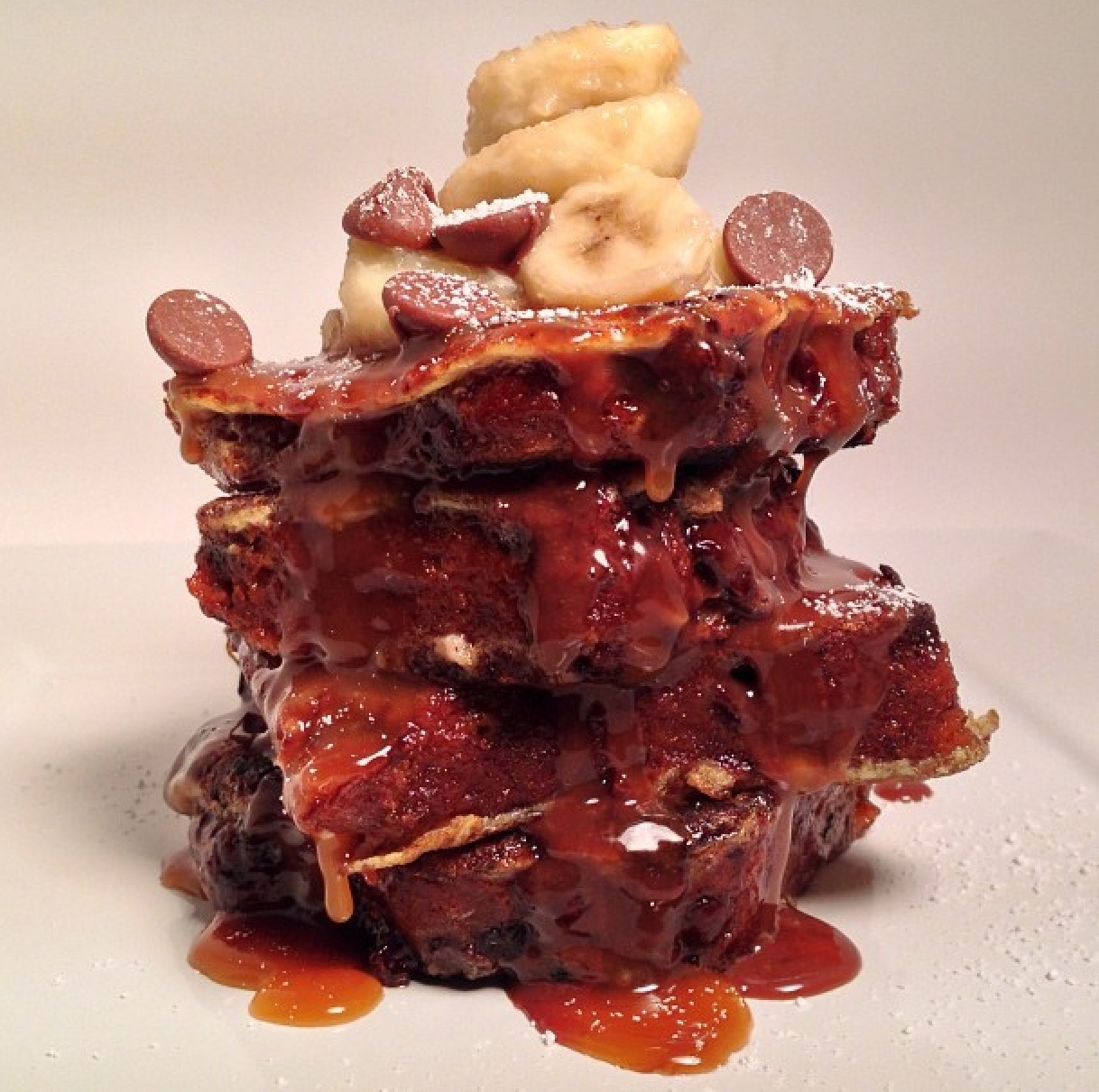 Chocolate Chip Banana Bread French Toast with milk chocolate sauce by @chef_patrick420