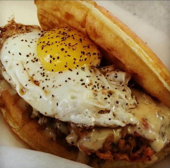 Chicken fried steak and gravy with an egg on top from @thewafflebus