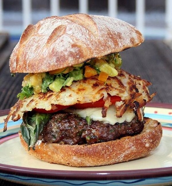 The Big Bad Wolf Burger with cheese, guacamole, spicy mayo and hash browns. Fire up that grill and try it at home!