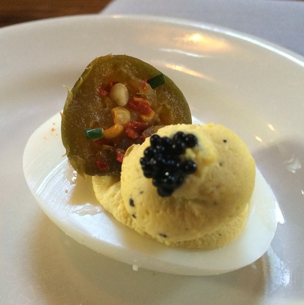 Deviled Egg with Caviar and a perfectly Pickled Jalapeño By @ChefRoble