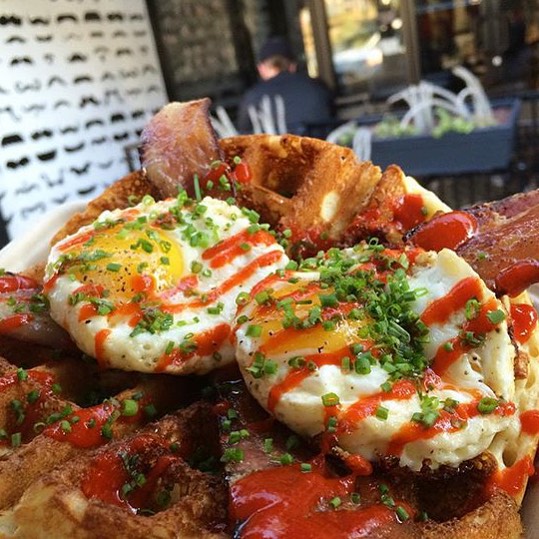 Here's one way to end #2015 on a HIGH NOTE - Bacon & Egg Waffles w/Sriracha and Chives By @FreeRangeLA!! Going down NOW at @alfredcoffee 3337 1/2 Sunset Blvd. Open until 3PM stop on by and tell Em #YouGottaEatThisSentYa!! || #YGET #WDYET #NewYearsEve #YouGottaEatThis #Bacon #Waffles #FoodPorn || #😳 #😍
