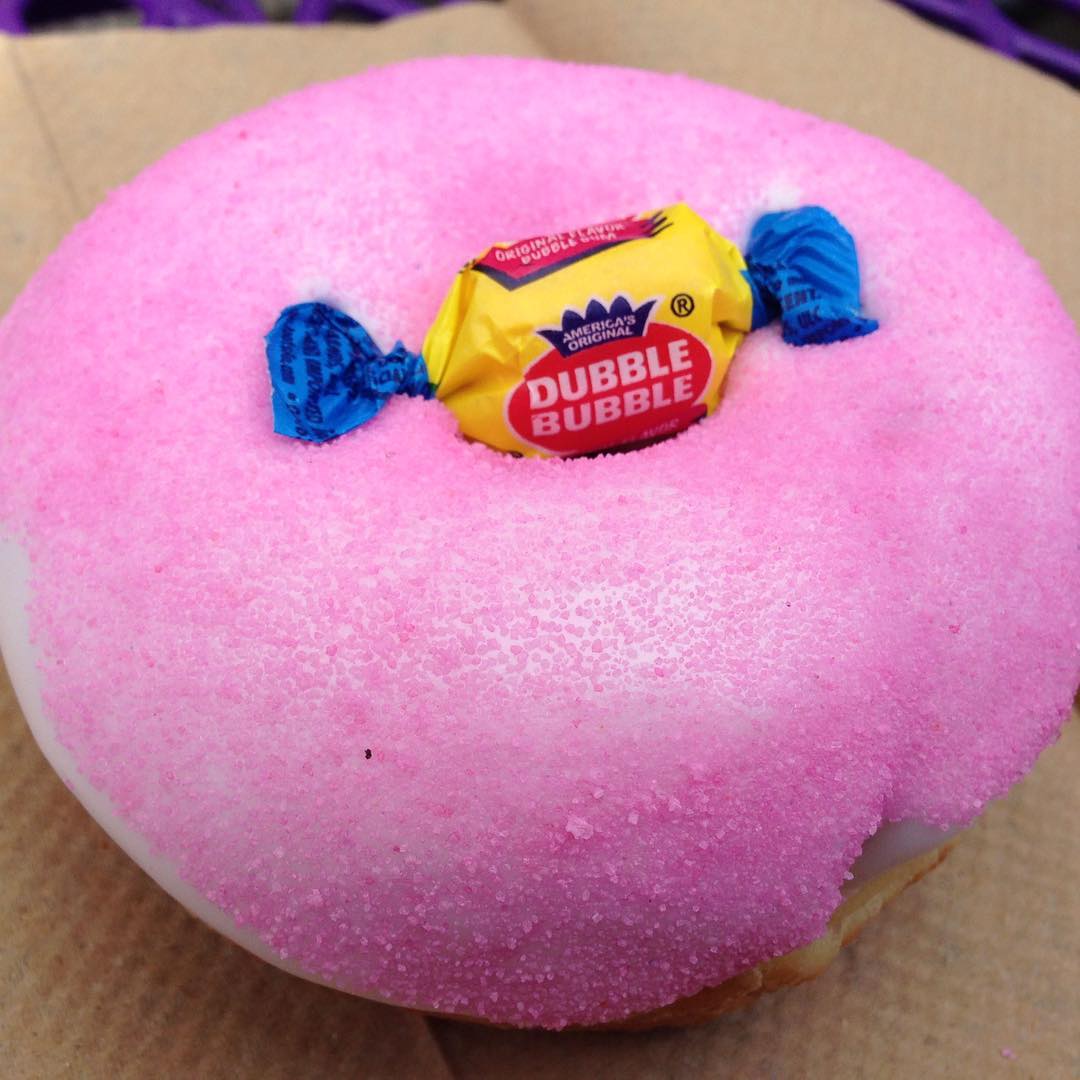 “The Dubble Bubble” Doughnut covered with Bubble gum icing and topped with an authentic Dubble Bubble gum from @VoodooDoughnut is a Favorite of ours and its Approved!! Click the Link in our BIO to check out the Full experience!! 😍💣🔥🔑🏆