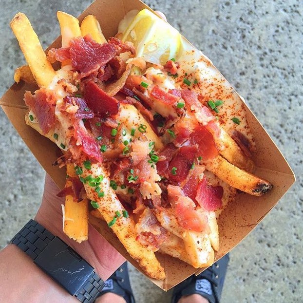 House cut fries smothered in Chowder & Bacon!! 📸: @fromwhereifeast