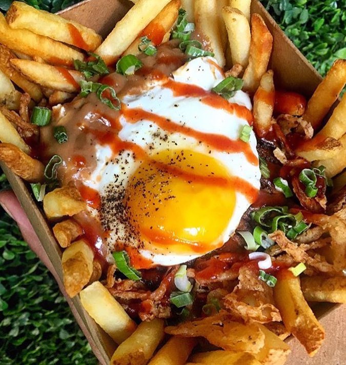 Poutine with Gravy, Cheese Curds, Meatloaf, Fried Battered Onions and a Fried Egg on a Bed of Fries!! | 🔥💣🔥