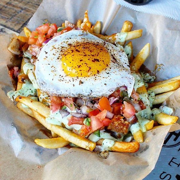 Creamy Pork-Belly Fries will have you going up in!! 🍟🍳🔥 Put this Place on your To Do List!! | 📸: @HangryAdventures
